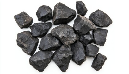 Large coal rocks with scattered small fragments, isolated on white background, representing traditional energy sources and natural minerals