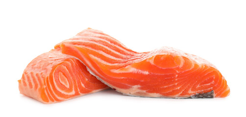 Pieces of fresh salmon isolated on white