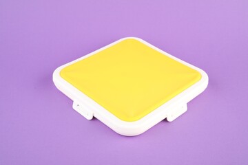 One sandwich lunch box on lilac background