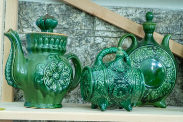 Various decanters for wine and drinks. Ukrainian clay ceramics. Green tableware. Jug and kettle...