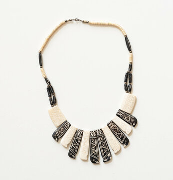 Tribal Batik Bone Bead Necklace &ndash; Boho Style Jewelry Flatlay on White Background