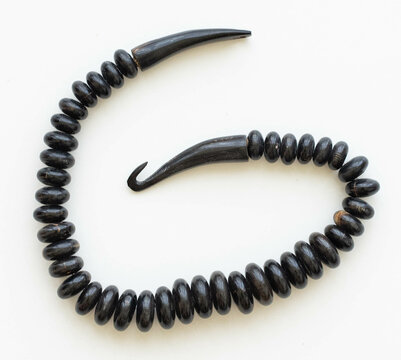 Natural Buffalo Horn Bead Necklace &ndash; Flatlay on White Background with Soft Lighting