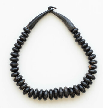 Natural Buffalo Horn Bead Necklace &ndash; Flatlay on White Background with Soft Lighting
