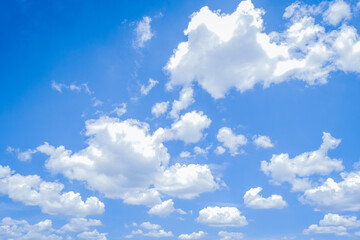 Bright Blue Sky with Fluffy White Clouds - Perfect Natural Background
