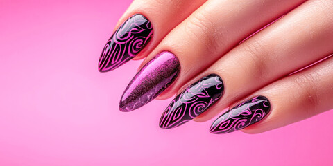 A close-up of a hand displaying intricate abstract nail art in black and purple on a pink background The design is bold and eye-catching