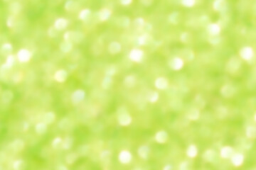 Obraz premium Green glitter bokeh background. Photo can be used for New Year, Christmas and all celebration concepts. 