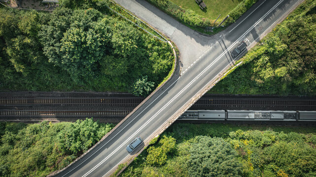 Aerial view of road and rail track in East Sussex, close to Brighton, UK
