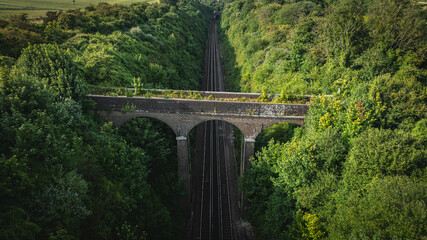 Rail track tunnel, in a green hill, Brighton, East Sussex, UK