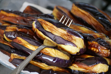 Eggplants cooked in oil were left to cool before placing them in the deep freezer