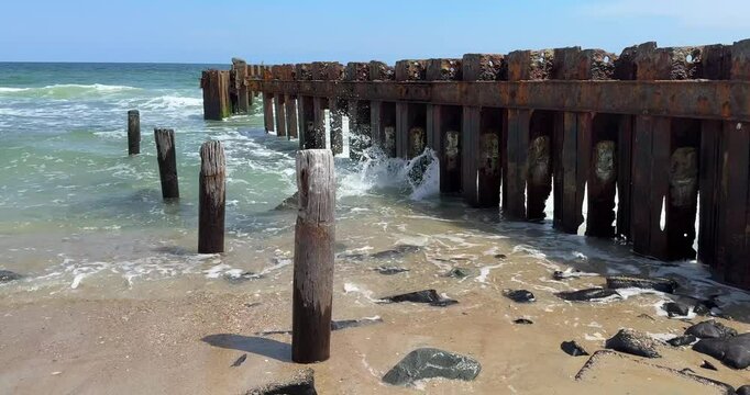 Old rusty broken and busted pier, Cape Hatteras National Seashore. Outer Banks, North Carolina
