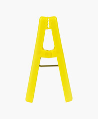 Yellow clothespin for indoor laundry