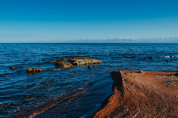 Issky-kul lake in Kyrgyzstan, summer picturesque landscape