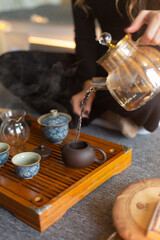 Chinese tea set, tea culture, interior photography, black background (Pu'er and black tea). tea ceremony. Blurry background. Without a face