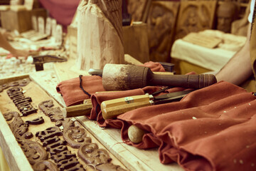 Wood Carving Tools on Artisan's Workbench at Craft Fair