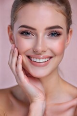 Obraz premium Cheerful young woman smiling while touching her face against a simple pink background in a joyful, lively atmosphere. Generative AI