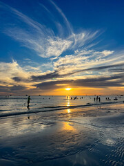 Colorful sunset with people silhouettes in Boracay island, Philippines 