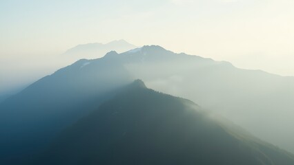 Serene Mountain View with Misty Atmosphere