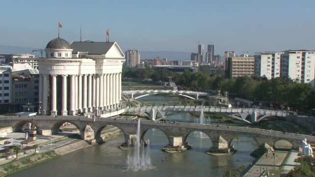Magnificient view of Stone Bridge, archaeology museum and other bridges over Vardar river, city center in Skopje, Macedonia