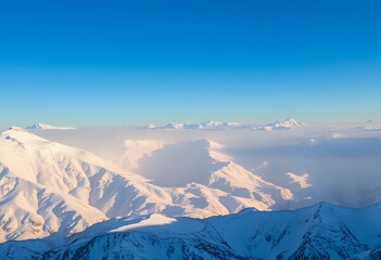 Snow-Covered Mountain Range under Clear Blue Sky
