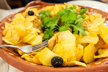 cod dish with potatoes portuguese style, bacalhau a braga. Typical recipe