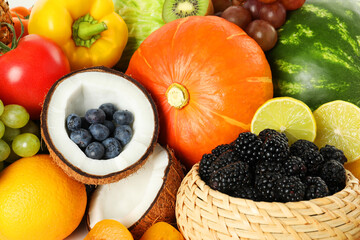 Different fresh vegetables and fruits as background, closeup