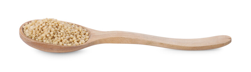 Raw couscous in wooden spoon isolated on white