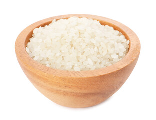 Raw rice in wooden bowl isolated on white