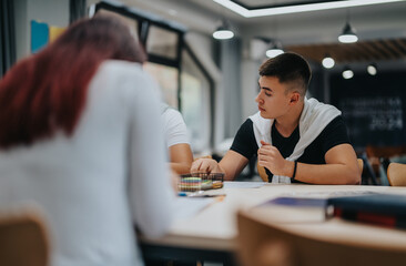 A group of students participating in a collaborative study session in a modern classroom. They are actively engaged in learning, discussing, and sharing ideas, creating an academic and focused