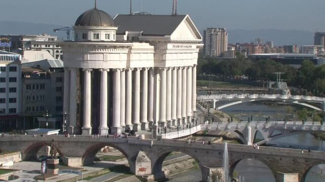 Magnificient view of Stone Bridge, archaeology museum and other bridges over Vardar river, city center in Skopje, Macedonia