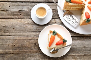 Delicious carrot cake served with coffee on wooden table, flat lay. Space for text
