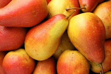 Fresh ripe juicy pears as background, closeup