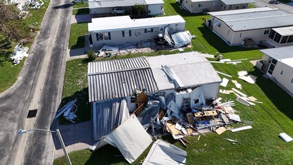 carport and sunroom destroyed in a mobile home along the coast in Palmetto, Florida © michael