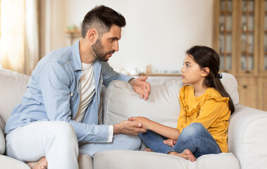 Supportive Arabic Dad Talking To Sad Preteen Daughter, Supporting Her In Childhood Struggles,...