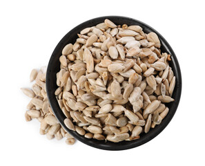 Peeled sunflower seeds in bowl isolated on white, top view