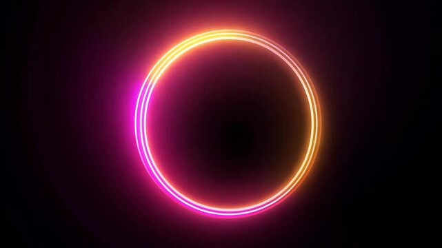 Neon circle is glowing and changing colors on a black background. Useful for many purposes like presentations, video editing, or special effects