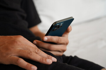 Close-Up of a Hand Holding a Smartphone