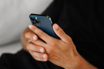 Close-Up of a Hand Holding a Smartphone