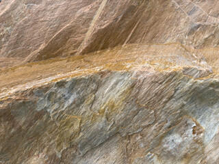 Gravel, granite and pebbles lying on the ground. Granite texture