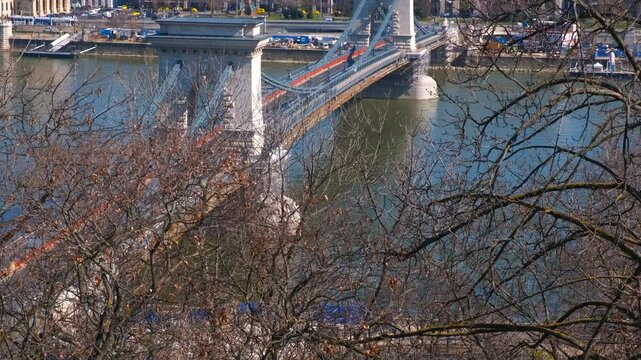 Hungarian secheni bridge in sun. A nice Budapest nature by Danube river with chained bridge under sun rays.