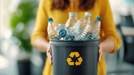 A close-up of a person holding a recyclable bin brimming with plastic bottles, highlighted by a vivid recycling symbol, advocating environmental responsibility and action.
