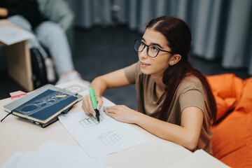 High school student attentively working on a geometric drawing during class. The image captures...
