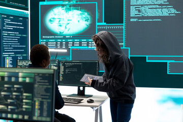 Cyber security specialist conducting cyber surveillance and threat detection in a governmental...