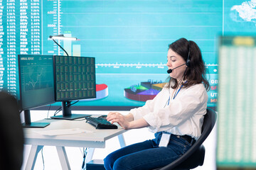 Office administrator exploring global partnership opportunities for the firm, establishing current enterprise goals. Forecast associates are doing a win or loss study, monitoring room.