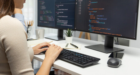 Hand focus with developers program typing coding creative website planning software version project...