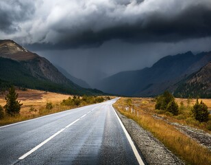 asphalt road and mountains with dark clouds before heavy rain