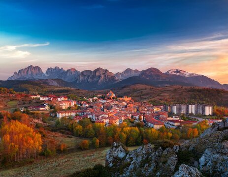 riano cityscape at sunset with mountain range landscape during autumn in picos de europa national park leon spain