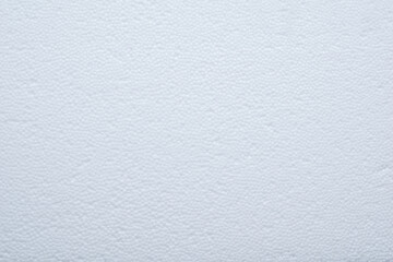 white styrofoam background with visible balls