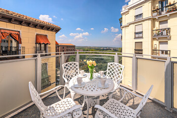 Fototapeta premium Spending time on the terrace reduces stress and improves mood.