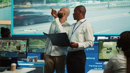 Experts monitoring real time urban traffic dynamics with help from surveillance footage and CCTV...