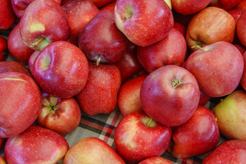 Delicious red apples on retail display at supermarket